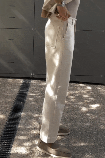 Pantalón denim relaxed crema