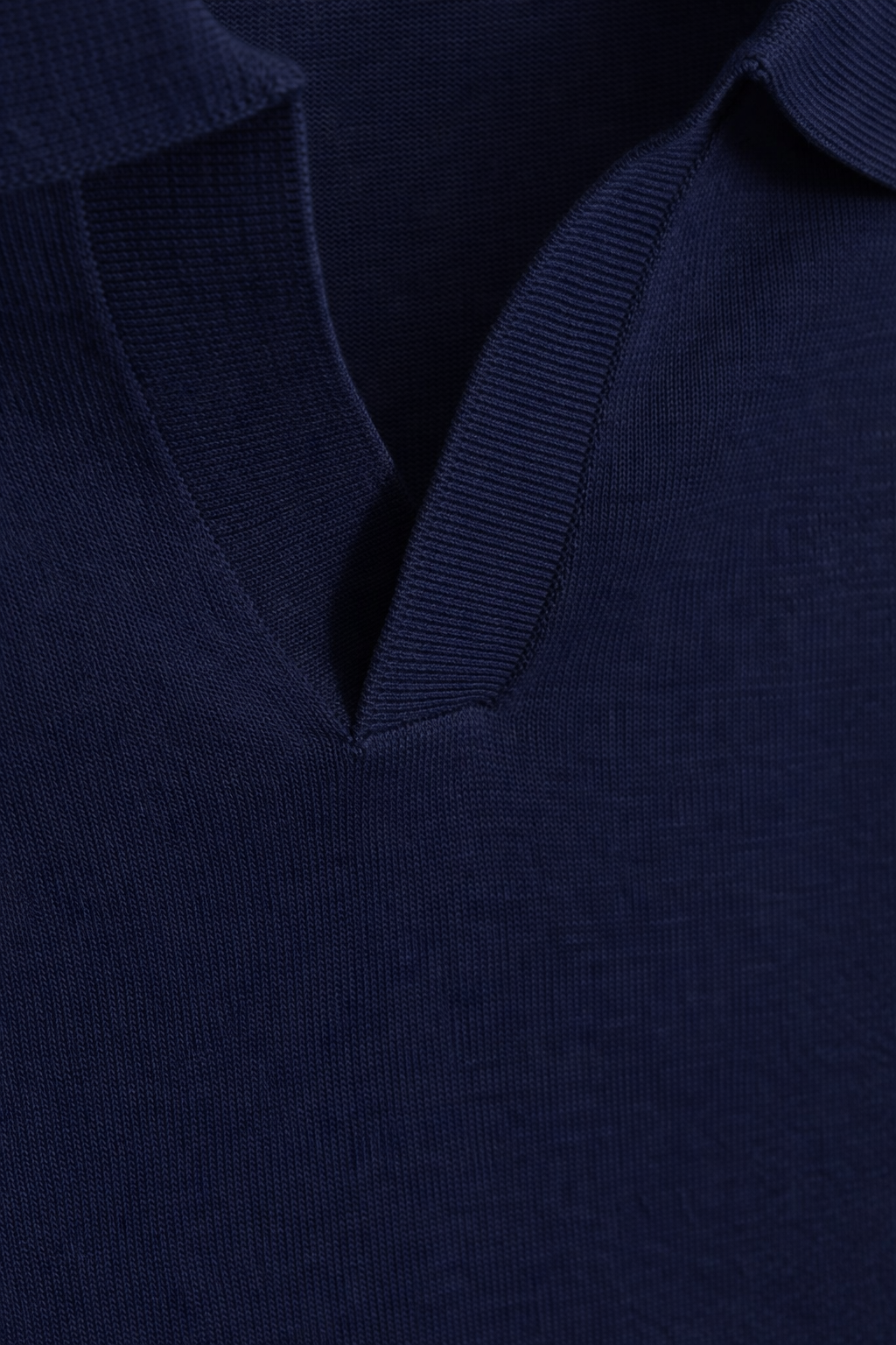 Polo punto azul marino