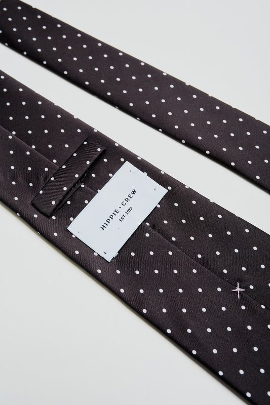 Corbata negra lunares