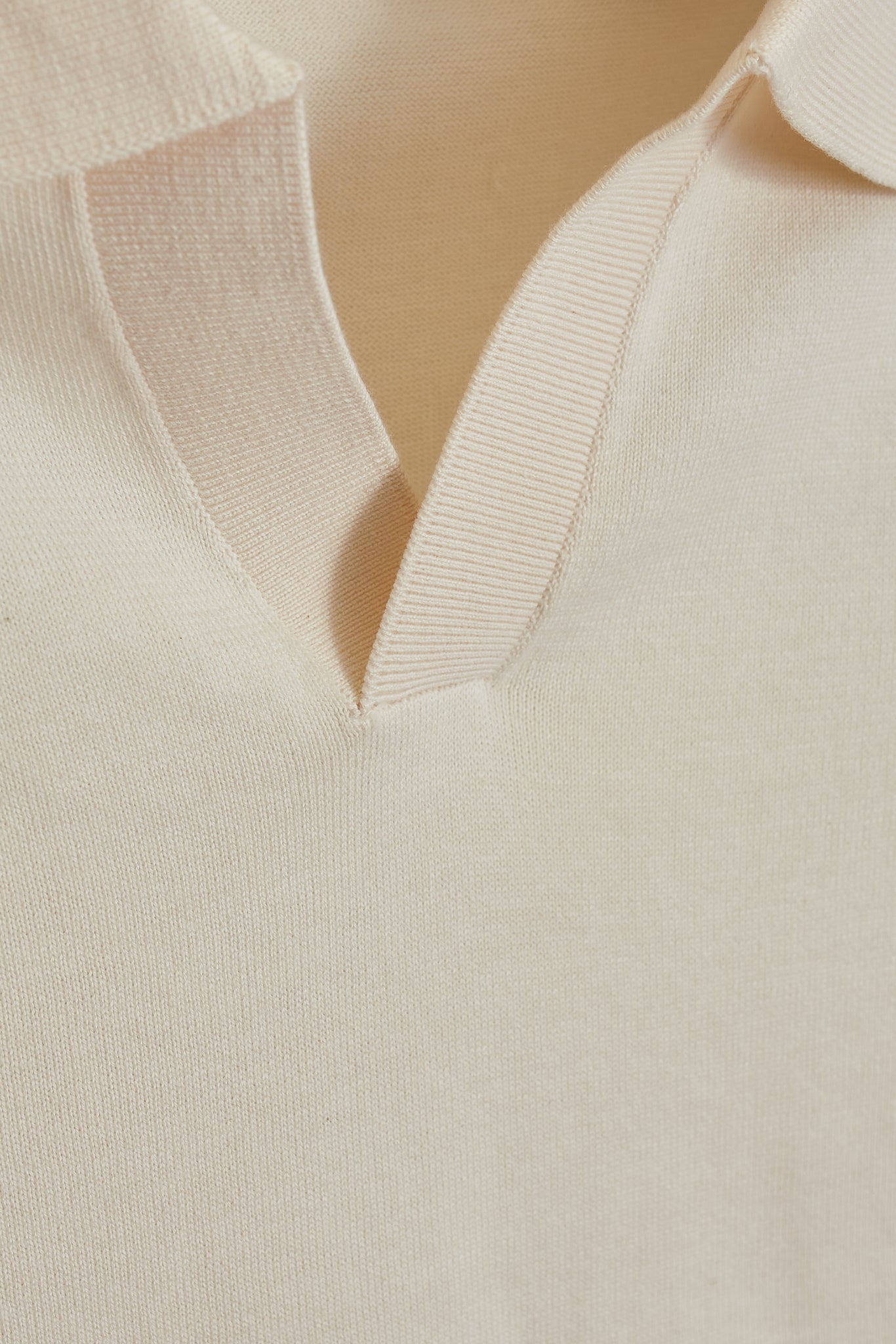 Polo punto crema