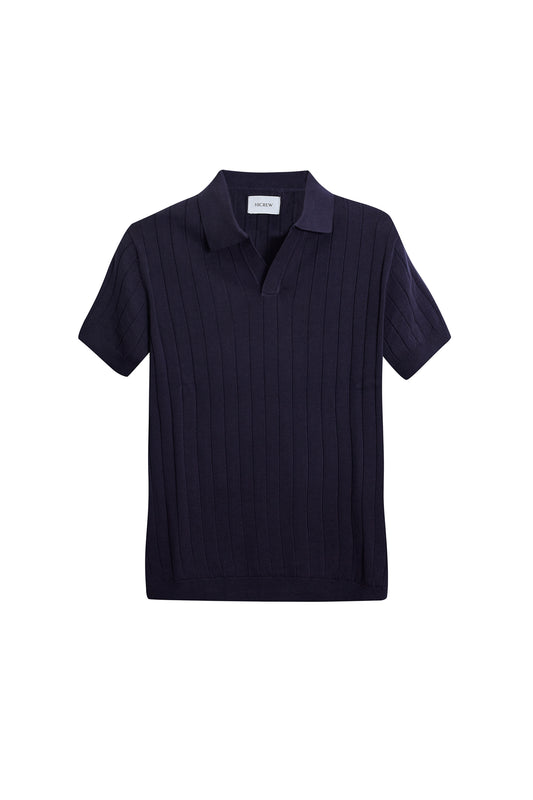 Polo punto canalé azul marino