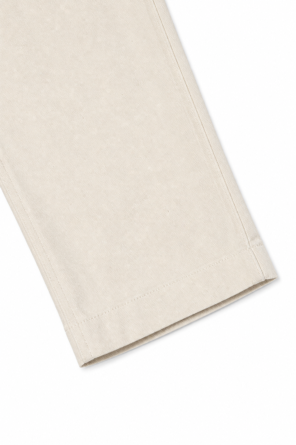 Pantalón denim relaxed crema