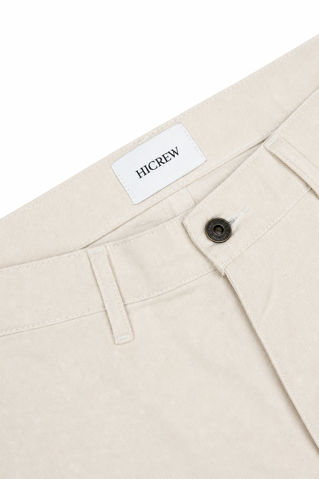 Pantalón denim relaxed crema