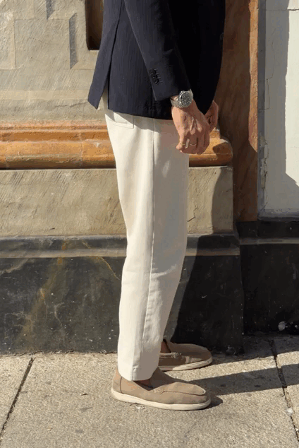 Pantalón denim relaxed crema
