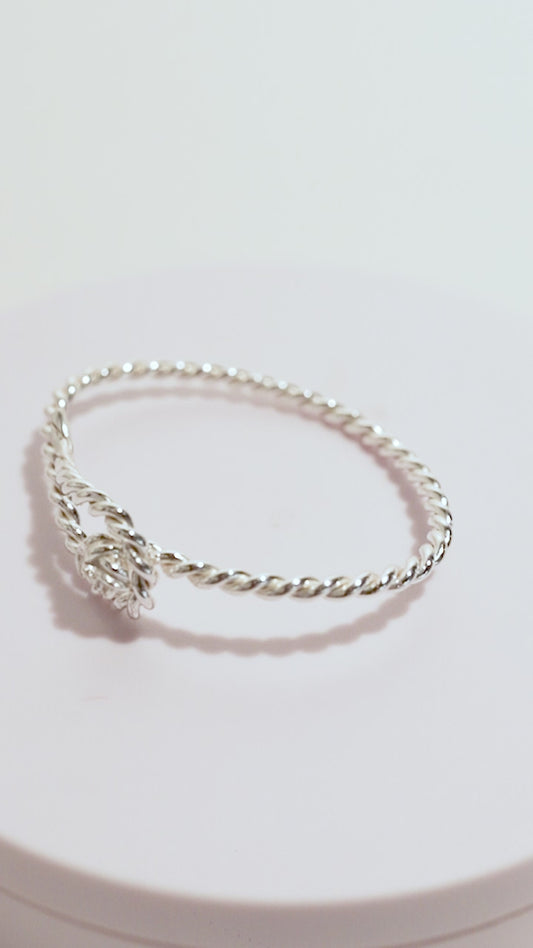 Pulsera plata espiral nudo